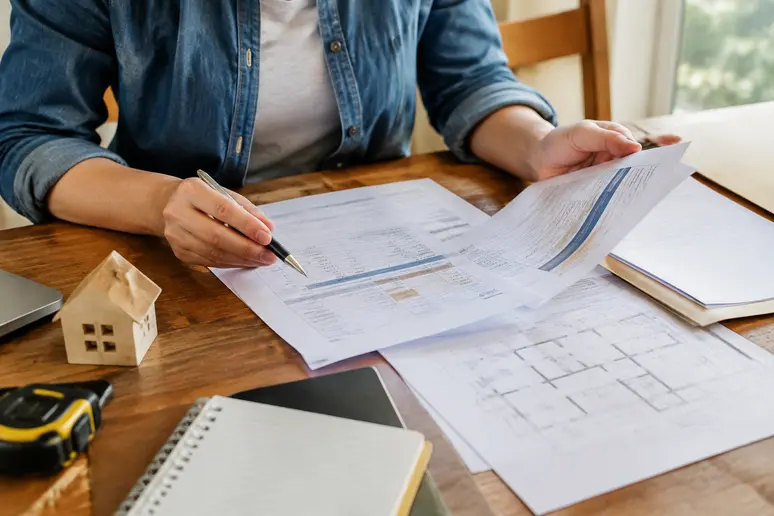 Vérification des documents administratifs et du devis avant l'achat d'un poêle